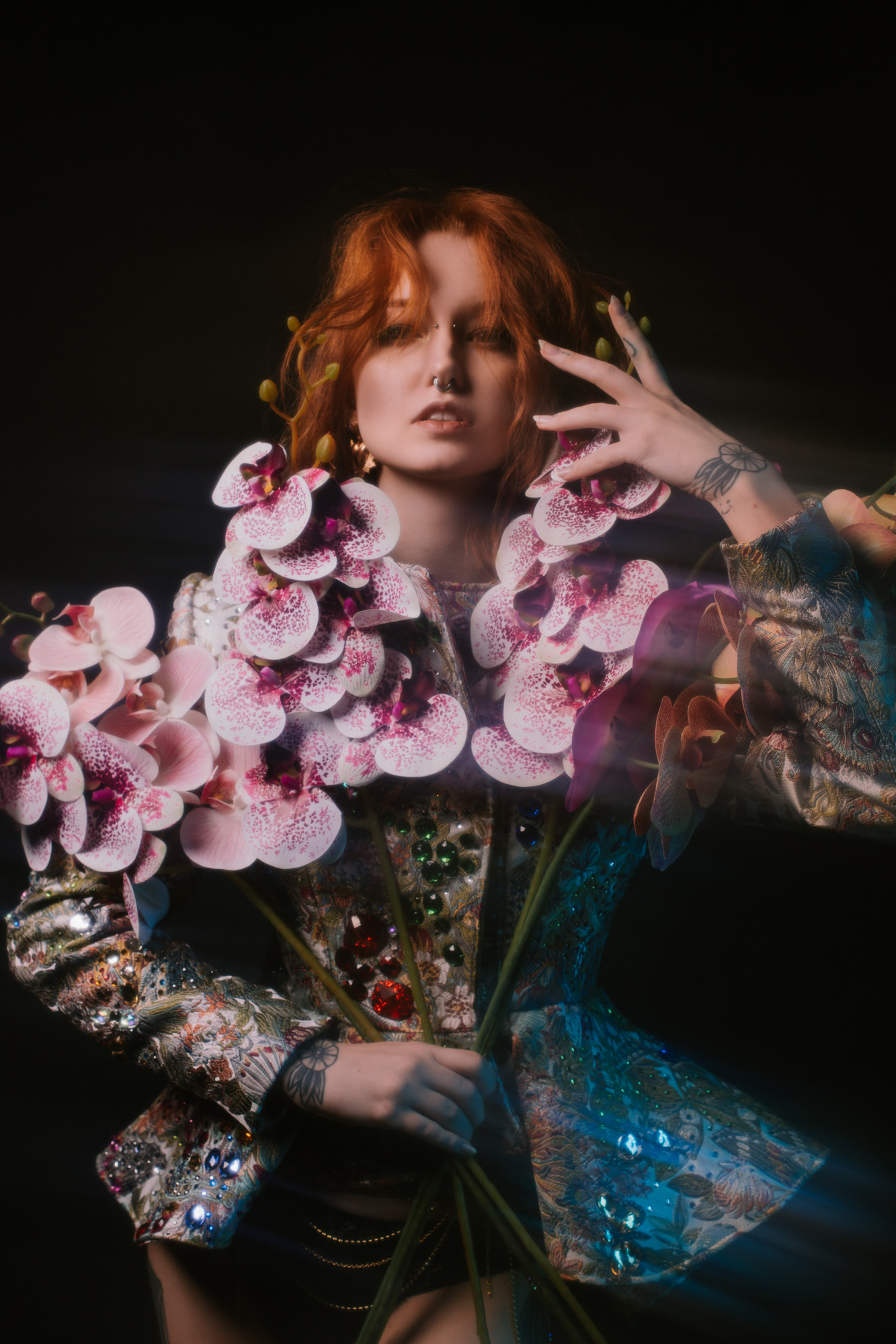 Model wearing a jacket with crystal beading